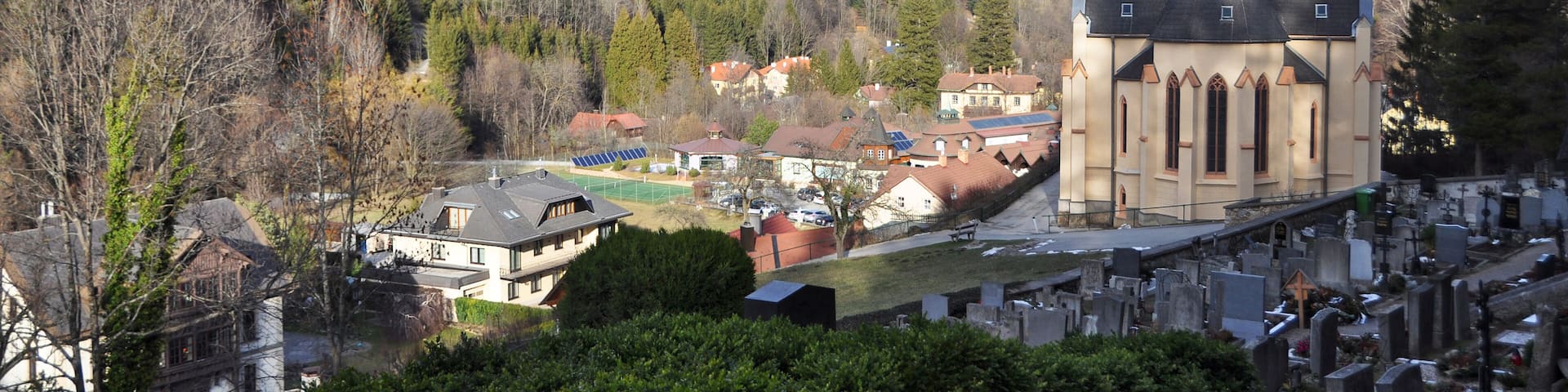 Church and cemetery in the alpine village Prein an der Rax. Austria