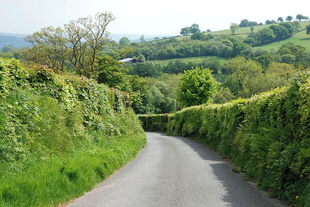 Descending road Once near the entrance to Gelli farm the gradient on this road eases, but it is still steep.