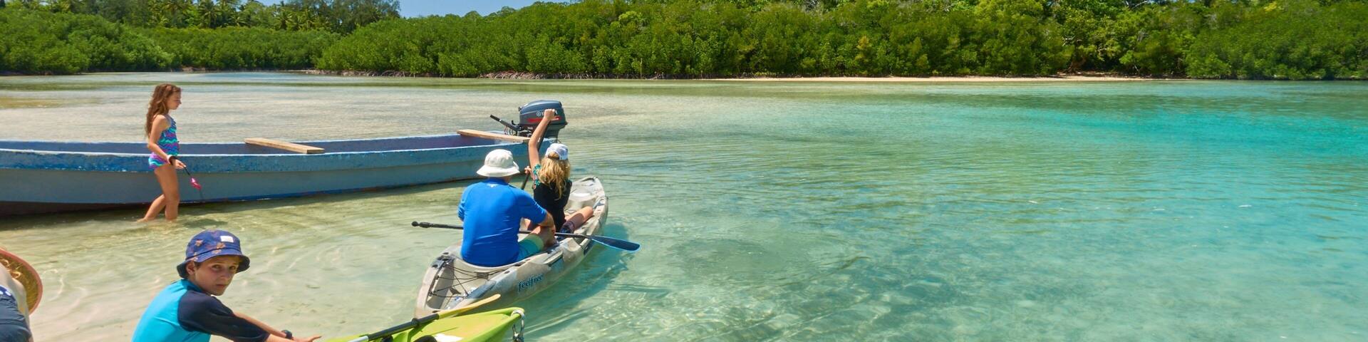 Malo Island featuring tropical scenes, general coastal views and kayaking or canoeing