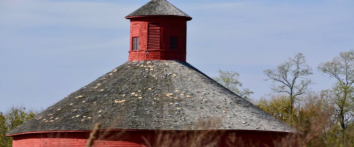 Went on a cross country road trip through Parke and Vermillion counties in Indiana. As we rounded the corner, we came across this wonderful round barn.