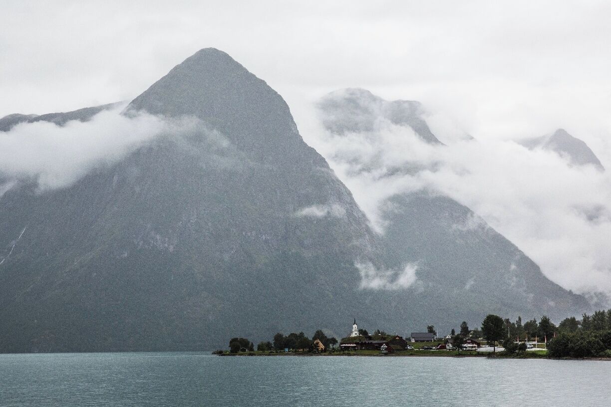 Norway in the rain.  This was taken in the town of Stryn on a very dreary day.  Somehow, Norway still looks amazing, and somewhat mysterious.  In our opinion, driving (and hiking) is the best way to see Norway.  It's not cheap to rent a car but the roads are very fun to drive and the scenery is awesome.