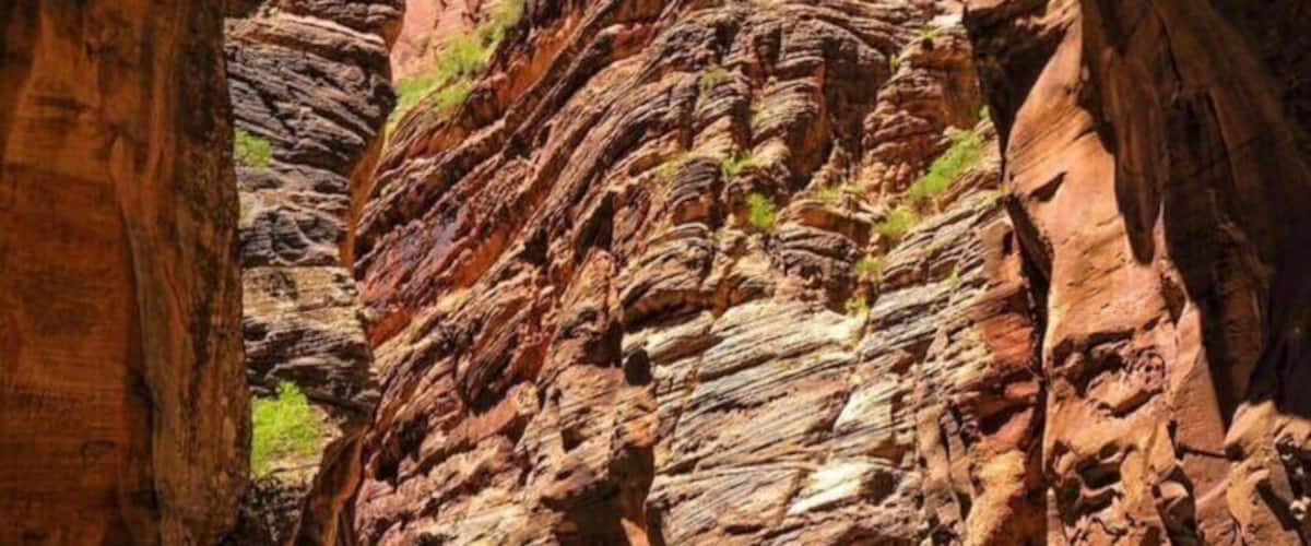 A canyon with a river flowing through it.
