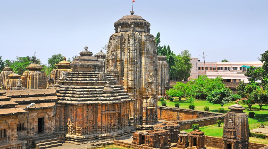 An ancient temple complex with intricate carvings and a prominent central tower.