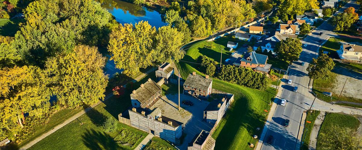 Aerial View of Historical Fort Amidst Suburban Homes and Greenery