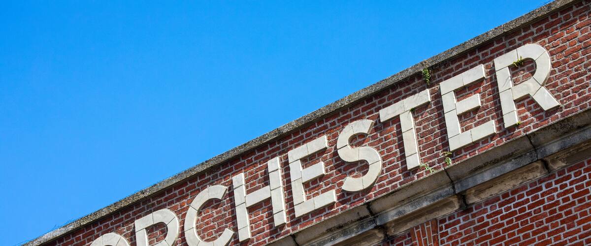 A brick building with the word "DORCHESTER" in large letters.