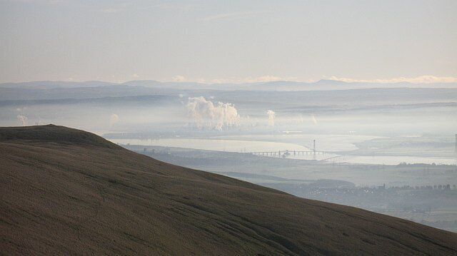 Wood Hill from Ben Ever The end of the ridge running southwards from Ben Ever with the Kincardine bridges and Grangemouth against a background of the Tweeddale Hills in Peeblesshire and Lanarkshire. Culter Fell is very clearly visible on the right.