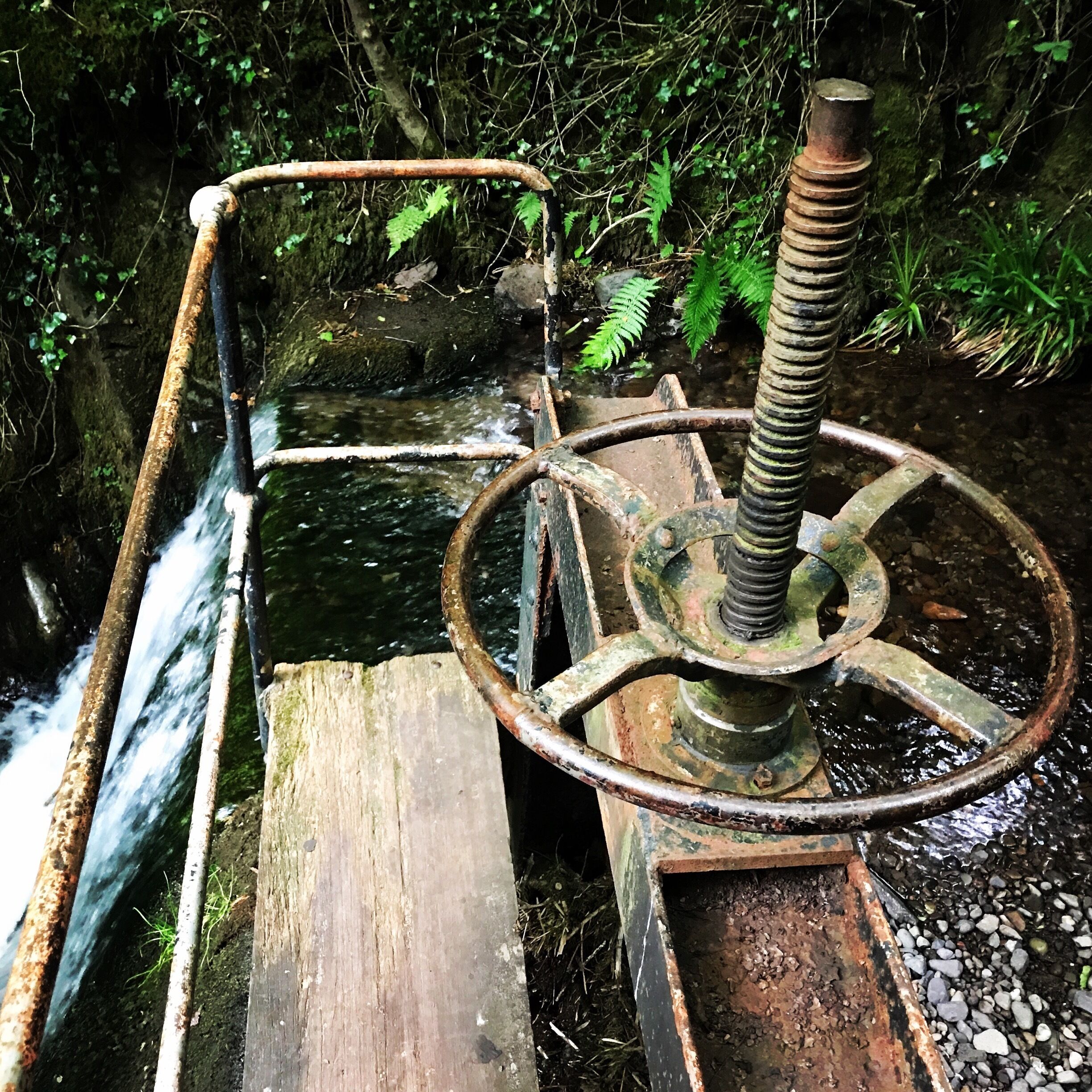 A water wheel ... not in use, but still intact at one of the smaller waterfalls which used to power the mills, back in the day ... I love the history of this glen 