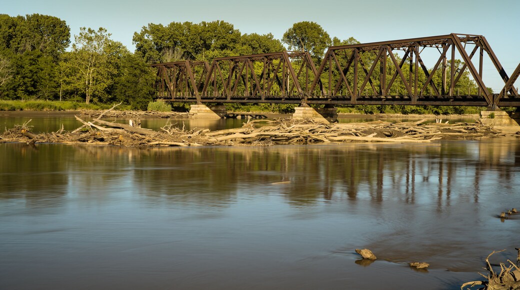 Iron through truss bridge crosses the Des Moines River from Ottumwa Iowa to Turkey Island. Train bridge built in 1911.