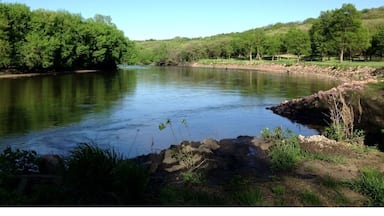 Large bend of the Big Sioux River winding through the wooded hillsides of Oak Grove State Park. #iowa