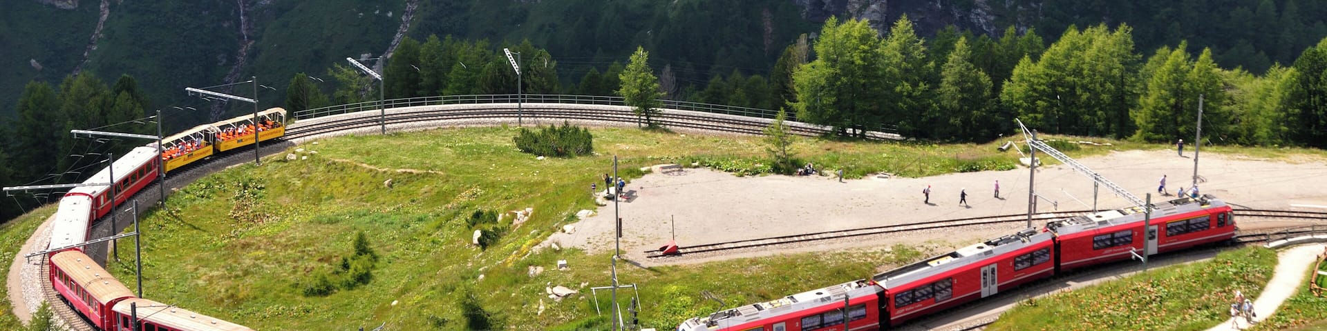 Switzerland, Graubünden, a North bound regional train with a new ABe 8/12 is entering Alp Grüm station