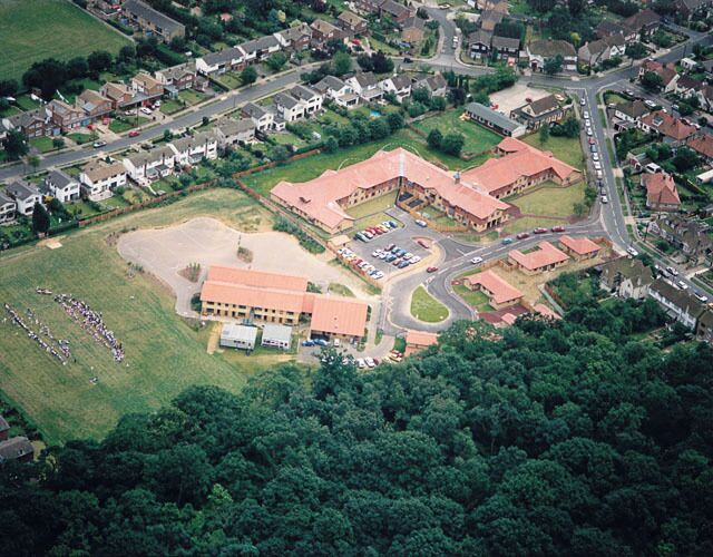 Aerial view of Westwood School and part of West Wood, Benfleet Westwood Primary School lies in the centre, next to west Wood in the lower part. The road in the upper left is Falbro Crescent, the road in the upper right (right of the school) is Beresford Gardens.
