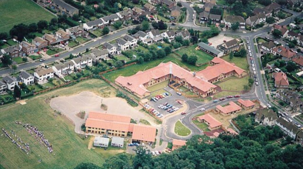 Aerial view of Westwood School and part of West Wood, Benfleet Westwood Primary School lies in the centre, next to west Wood in the lower part. The road in the upper left is Falbro Crescent, the road in the upper right (right of the school) is Beresford Gardens.