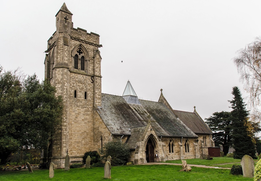 There has been a church on the site since the 13th century. By 1854 the church was in a dilapidated condition and was rebuilt in 1855 by Hussey, using much of the old materials. There was a nave with clerestory, north and south aisles, and also a spire on the tower roof. The lower stages of the tower still contain some mediaeval masonry. In 1916 there was a severe fire which left only the walls standing. Due to limited funds, only the chancel was given a permanent roof, the nave had a temporary roof which lasted nearly 80 years! The spire was never rebuilt, and the aisle arcades replaced with brick and concrete ones. The church was re-ordered in 1992 when the nave and aisle roofs, internal columns and pews were removed, and a new roof which spans the whole width of the church containing a glass lantern skylight. Services are now held in the nave part of the church, with the chancel being used for the creche and for more intimate services. There is a fine east window by Edward Payne. The church now has a Kitchen, toilet and Wi-fi.