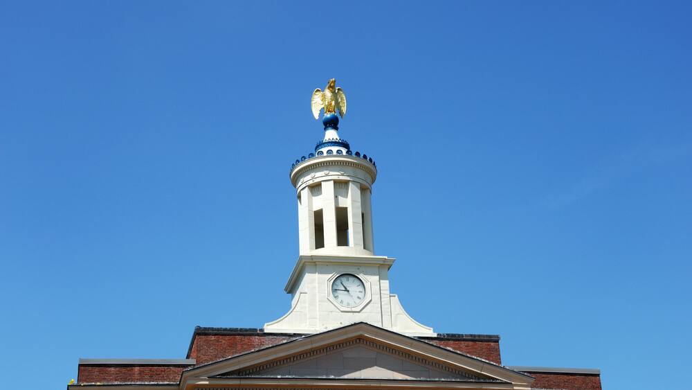 closeup on golden eagle statue on city hall tower of Nashua NH