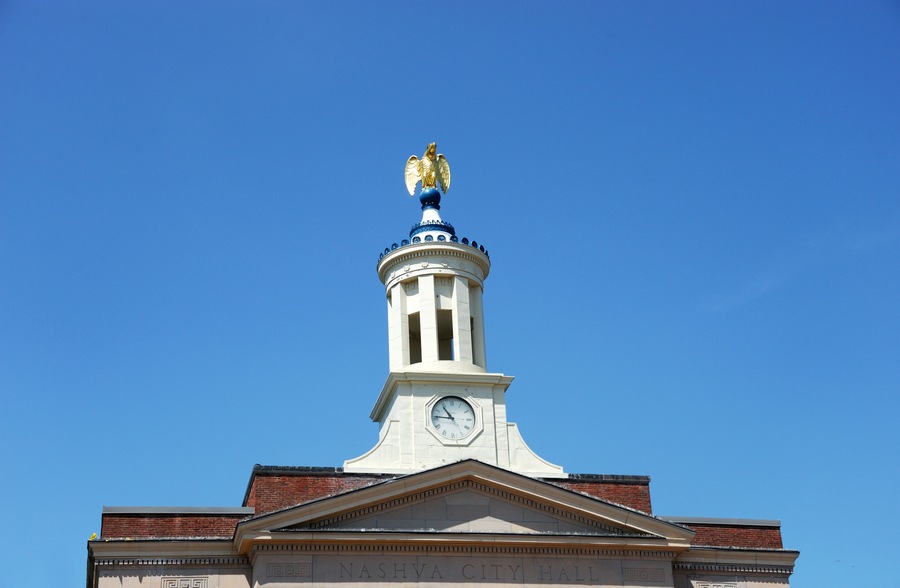 closeup on golden eagle statue on city hall tower of Nashua NH