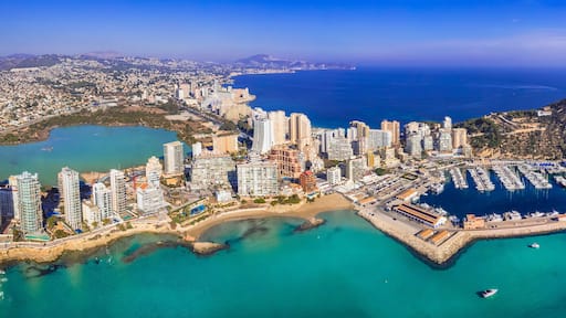 Costa Blanca, Spain. Aerial drone panoramic view of coastal city Calpe with great beaches. Alicante province.
