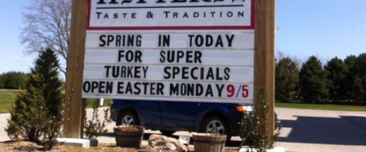 A sign for Hayter's Farm advertising spring turkey specials and an open Easter event.