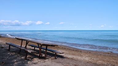 Isolated Picnic table on the Beautiful Beach of Huron Lake near Goderich, Ontario, Canada