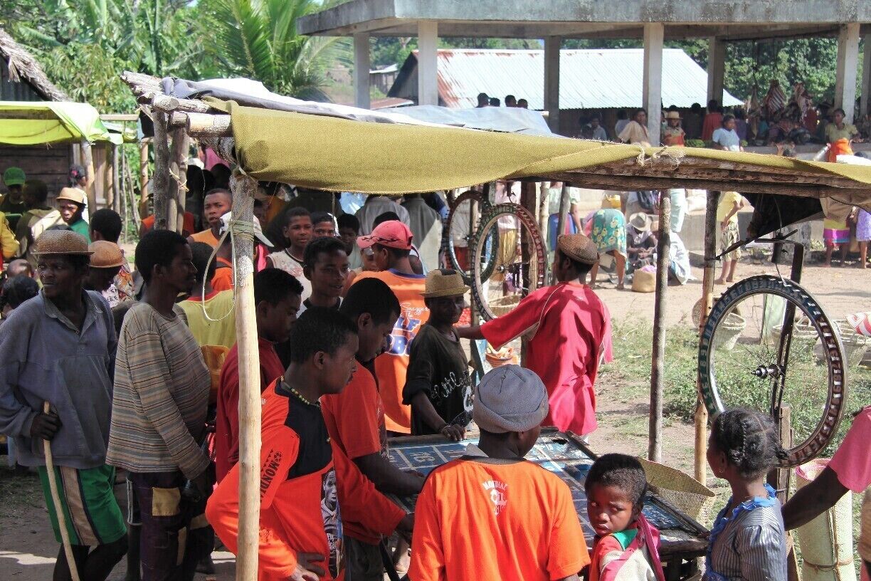 Roulette on market day, a more basic version than the gamblers in Vegas play.

#market