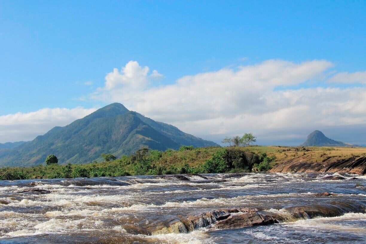 A four hour walk through the midday heat brought us to this refreshingly cold river
