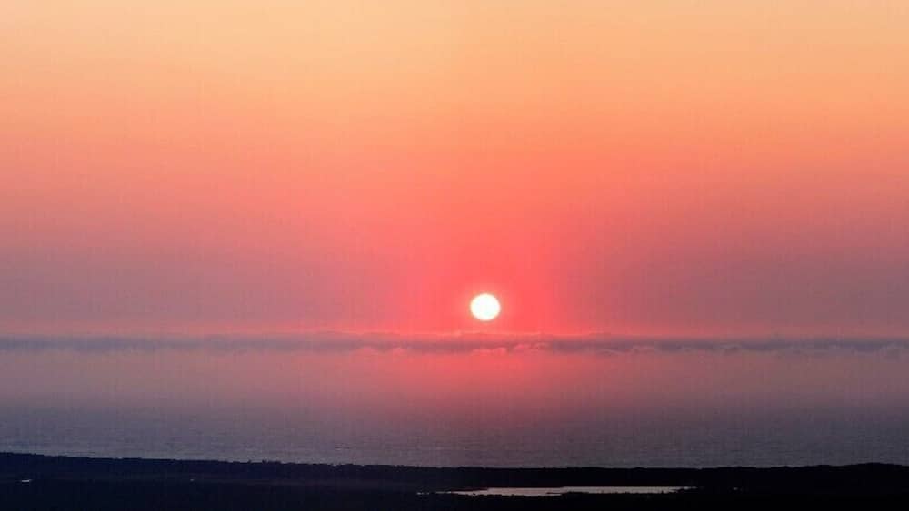 Sunrise over the Indian Ocean from Jupiter Hill (so called, because one of the other volunteers thought the red light on top of the telephone mast was Jupiter on one of the first nights)
