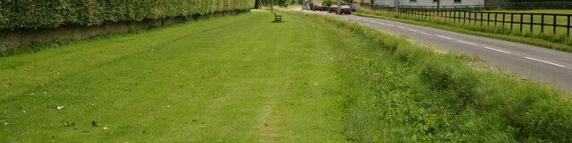 Road into Appleshaw Road into Appleshaw with village church behind the end of the hedge