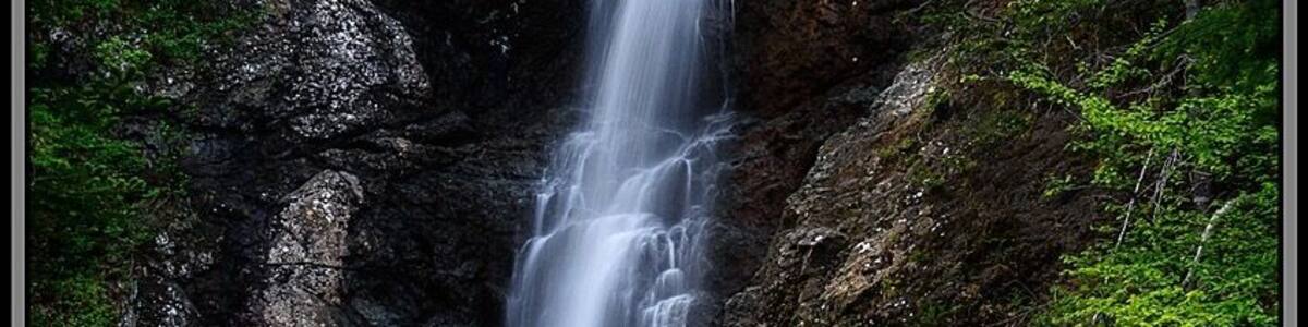 This waterfall is at the end of a short trail named Copper Mine Falls Trail near York Harbour, NL. The trailhead to the Copper Mine Hiking Trail is at this same location. This waterfall is well worth the short hike it takes to get to it! #Hiking