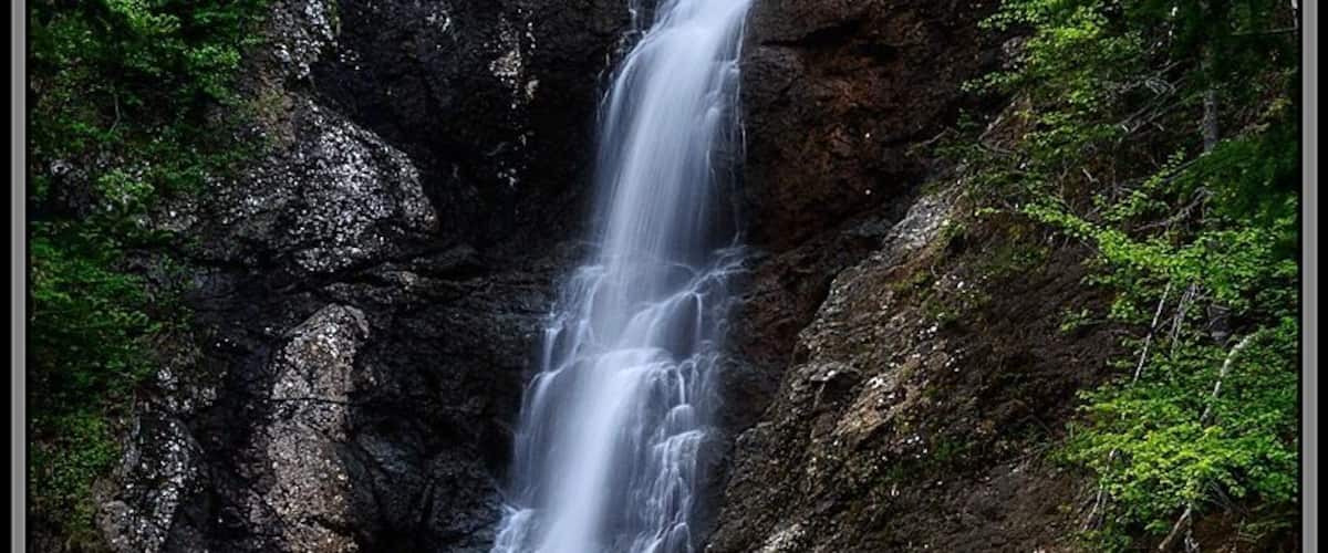 This waterfall is at the end of a short trail named Copper Mine Falls Trail near York Harbour, NL. The trailhead to the Copper Mine Hiking Trail is at this same location. This waterfall is well worth the short hike it takes to get to it! #Hiking