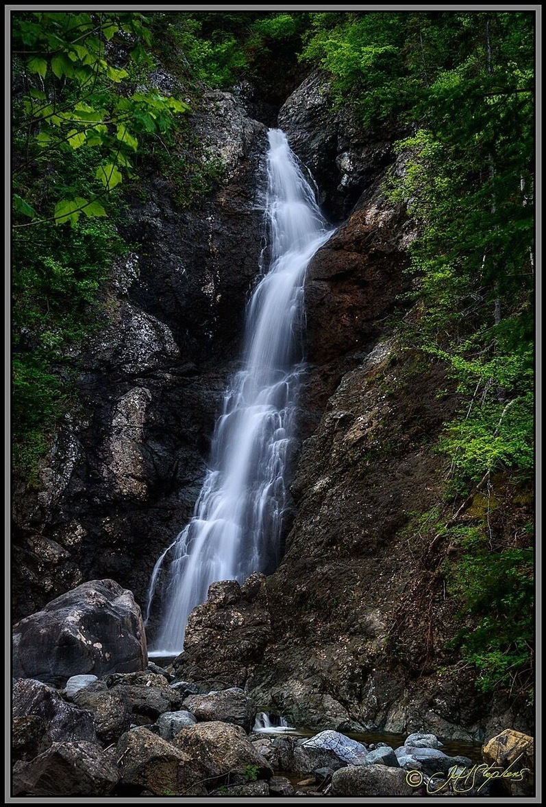 This waterfall is at the end of a short trail named Copper Mine Falls Trail near York Harbour, NL. The trailhead to the Copper Mine Hiking Trail is at this same location. This waterfall is well worth the short hike it takes to get to it! #Hiking