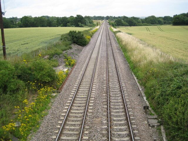 Woodborough, looking east: Main railway line to London, 79 miles ahead Well, the 1889 Ordnance Survey 6" to the mile map shows a railway mile post here at the Broad Street road bridge with that mileage on it, and I do not think that the route has changed since.