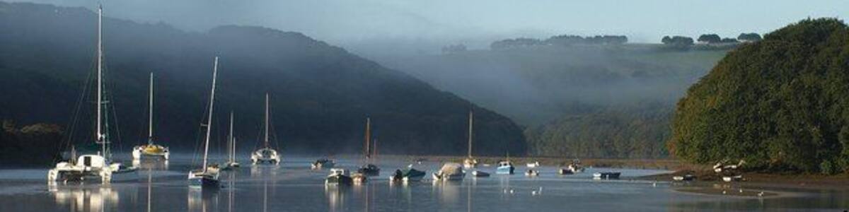 Boats on the Avon estuary. Compared to 1510191, the mist has largely cleared over the estuary.
