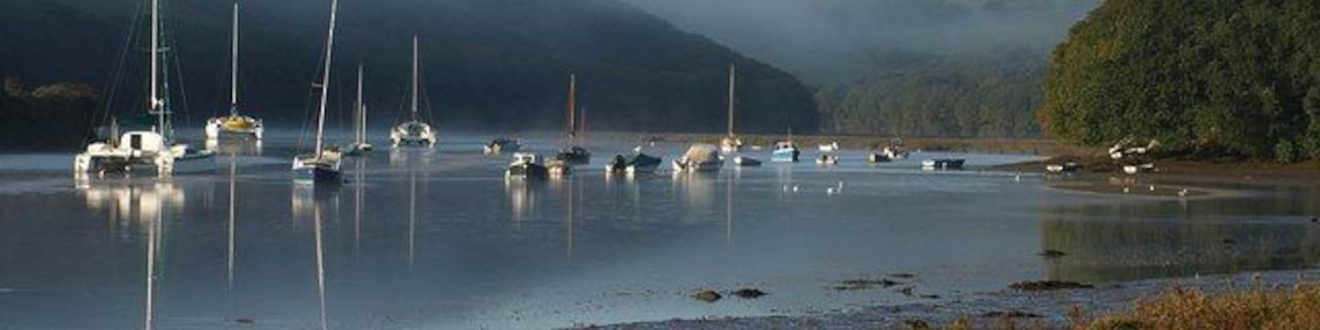 Boats on the Avon estuary. Compared to 1510191, the mist has largely cleared over the estuary.