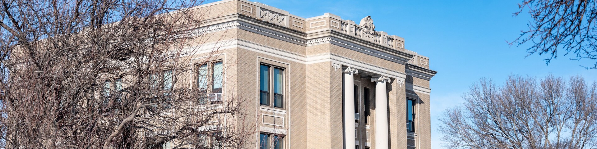Outside view of the Sheridan County Courthouse in Hoxie, Kansas, USA. A historic old building.