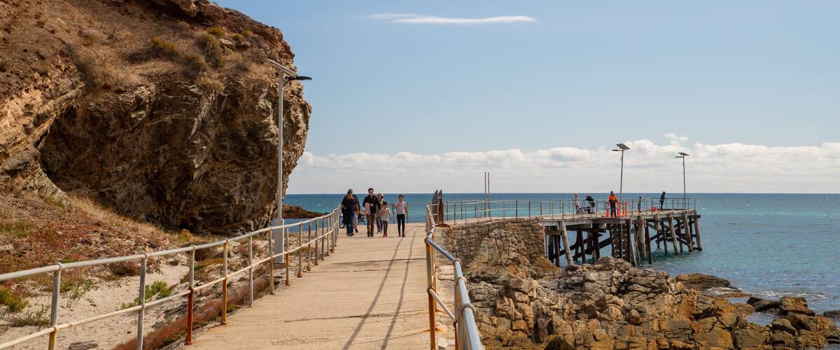 Second Valley showing general coastal views and rocky coastline as well as a small group of people