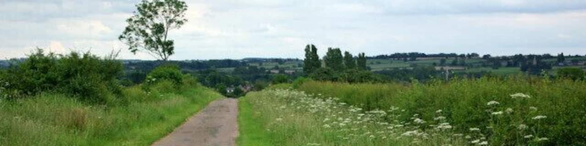 Private Road across Coldharbour Hill This is a private road, signed no vehicles except for access to farms, but it is also a public footpath. It is seen here descending from Coldharbour Hill to Harrold.