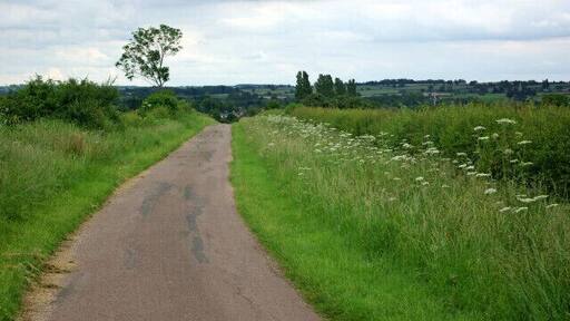 Private Road across Coldharbour Hill This is a private road, signed no vehicles except for access to farms, but it is also a public footpath. It is seen here descending from Coldharbour Hill to Harrold.