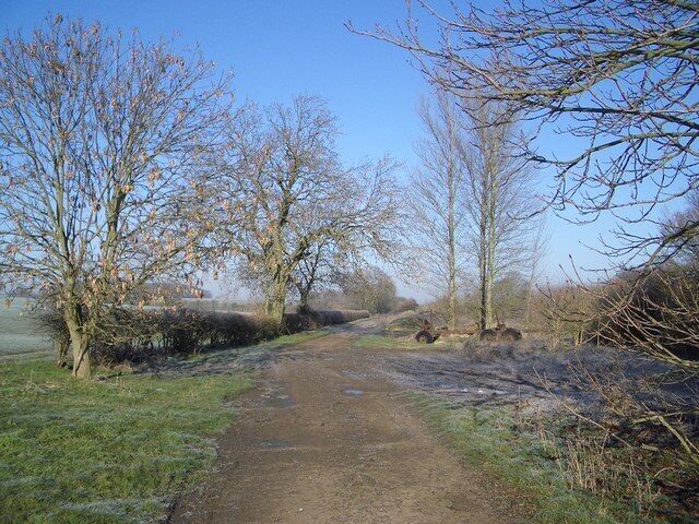 The Milton Keynes Boundary Walk SW of Harrold This part of the Boundary Walk is near the end of New Road to the south-west of Harrold. The disused trailer visible on the right was formerly used to haul tree trunks, probably from the nearby Lavendon and Nun Woods.