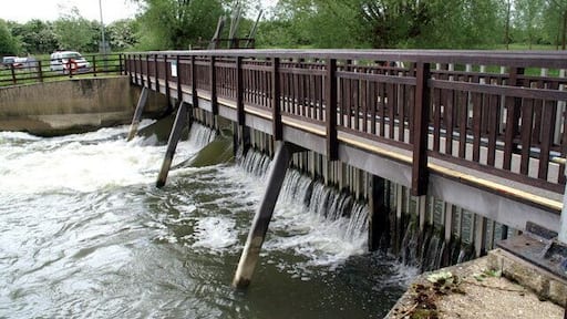 Weir and footbridge by Northmoor Lock on the River Thames in Oxfordshire