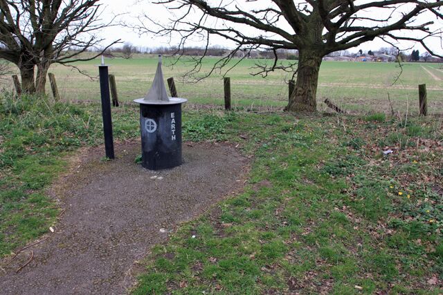 The York Solar System Model - Earth The disused railway line is an ideal place for a concept that can be modelled in a straight line, such as a solar system model. This part of the model is the earth and moon (separate pedestal), and beyond are the cropfields northwest of Bishopthorpe village.