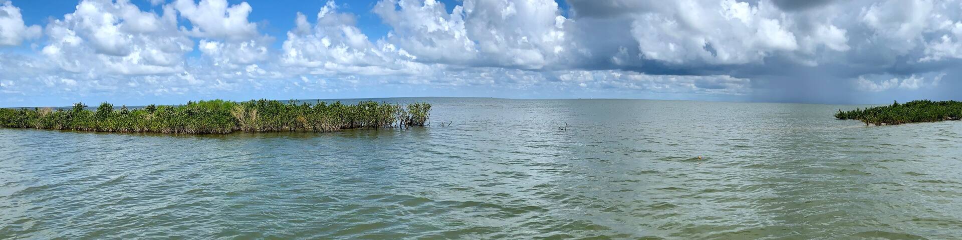 Blue sky and perfect fishing water off the coast of Louisiana panorama