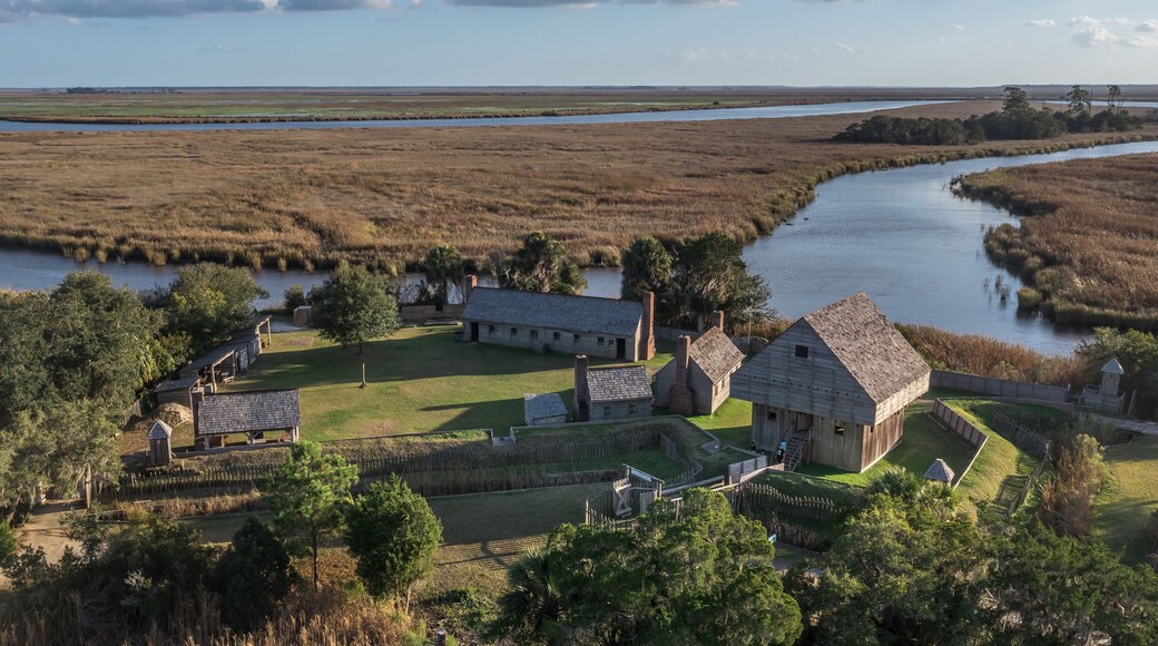 Aerial view of Fort King George historic site, oldest English fort on the Georgia coast from the 17th century with wooden palisade, gun ports for cannons blue cloudy sky near Darien Georgia USA