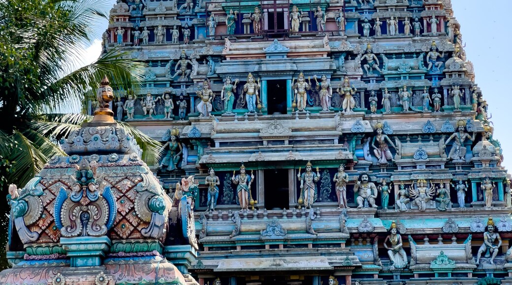 The gopuram tower of Sangameshwarar Temple at Bhavani Kooduthurai in Erode district, Tamil Nadu, adorned with colorful deity sculptures and carvings.