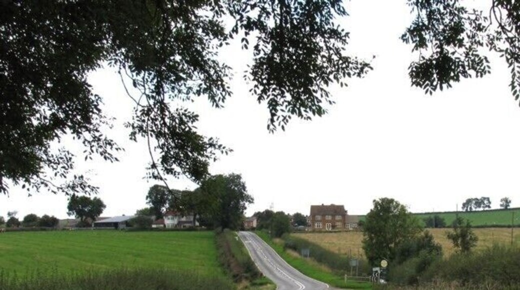 Sutton Road/Dingley Lane/Midshires Way. Sutton Road joins Dingley Lane from the left. The Midshires Way crosses the road junction from left to right (or right to left).