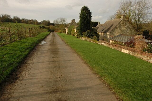 Cottages in Cockleford Cottages beside a no through road near Butlers Hill Farm.
