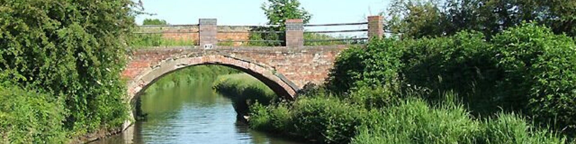 Bridge No 37 over Oxford Canal southwest of Easenhall, Warwickshire. It carries a farm track and a public footpath between Easenhall and King's Newnham.