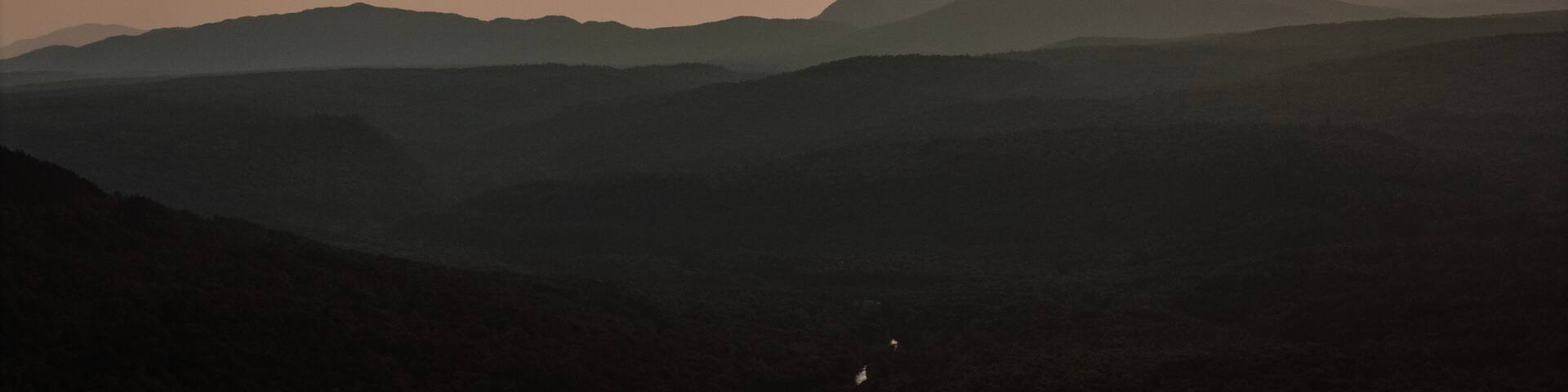 Sunset over the vast 100 mile wilderness area of the Maine woods