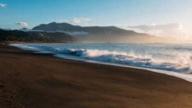 Misty and steaming waves along the shore at dawn in Dingalan, Aurora, Philippines