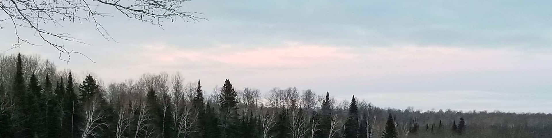 Cold day in late fall overlooking St. Froid Lake from public boat landing.