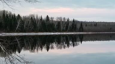 Cold day in late fall overlooking St. Froid Lake from public boat landing.