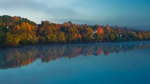 Sunrise breaks through the fog on the kennebec river; Gardiner, maine, united states of america
